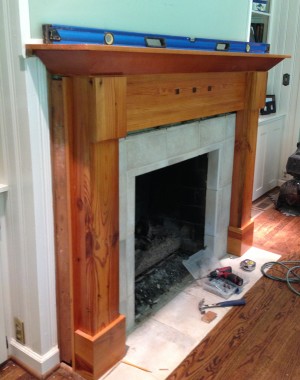 This is a custom mantel we built from reclaimed pine.